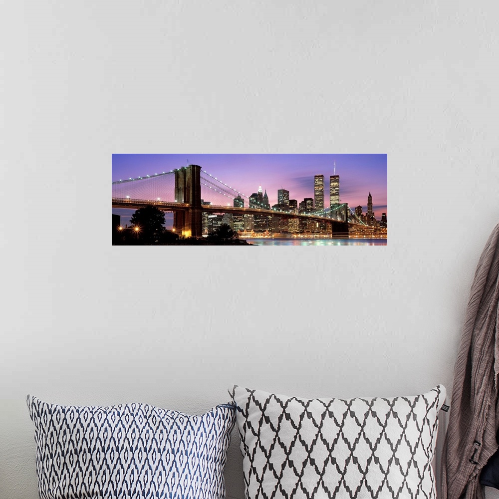 A bohemian room featuring This large wall art has a dominating sky at twilight giving a panoramic view of lower Manhattan a...