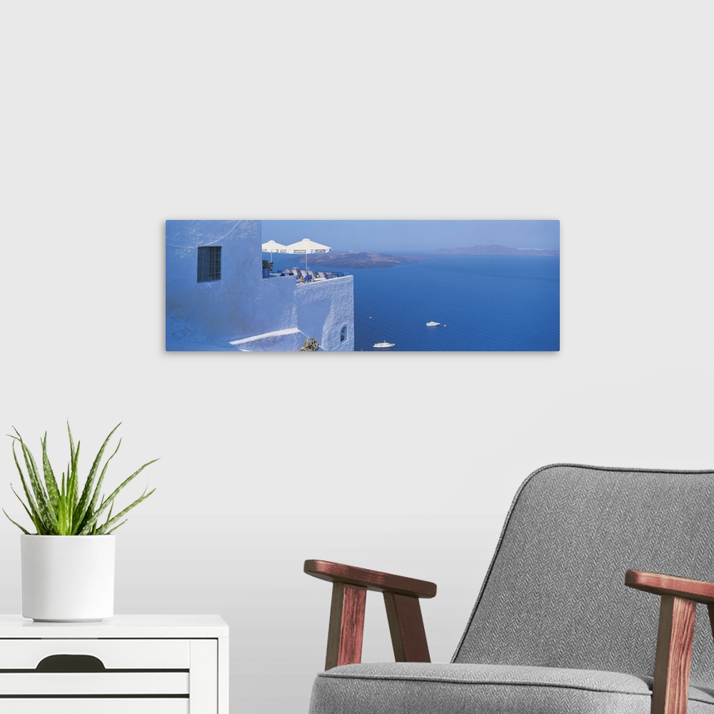 A modern room featuring Building On Water, Boats, Fira, Santorini Island, Greece