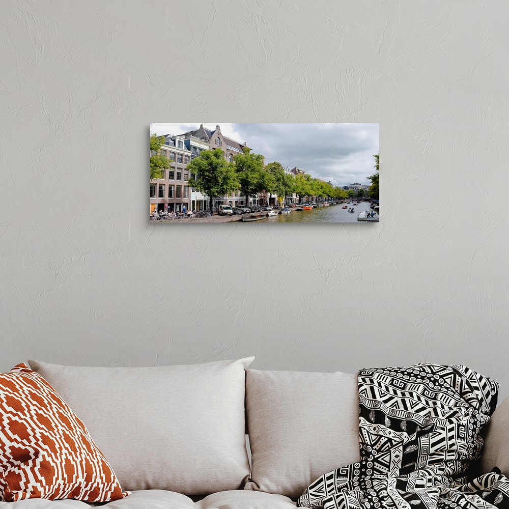 A bohemian room featuring Buildings along a canal, Amsterdam, Netherlands