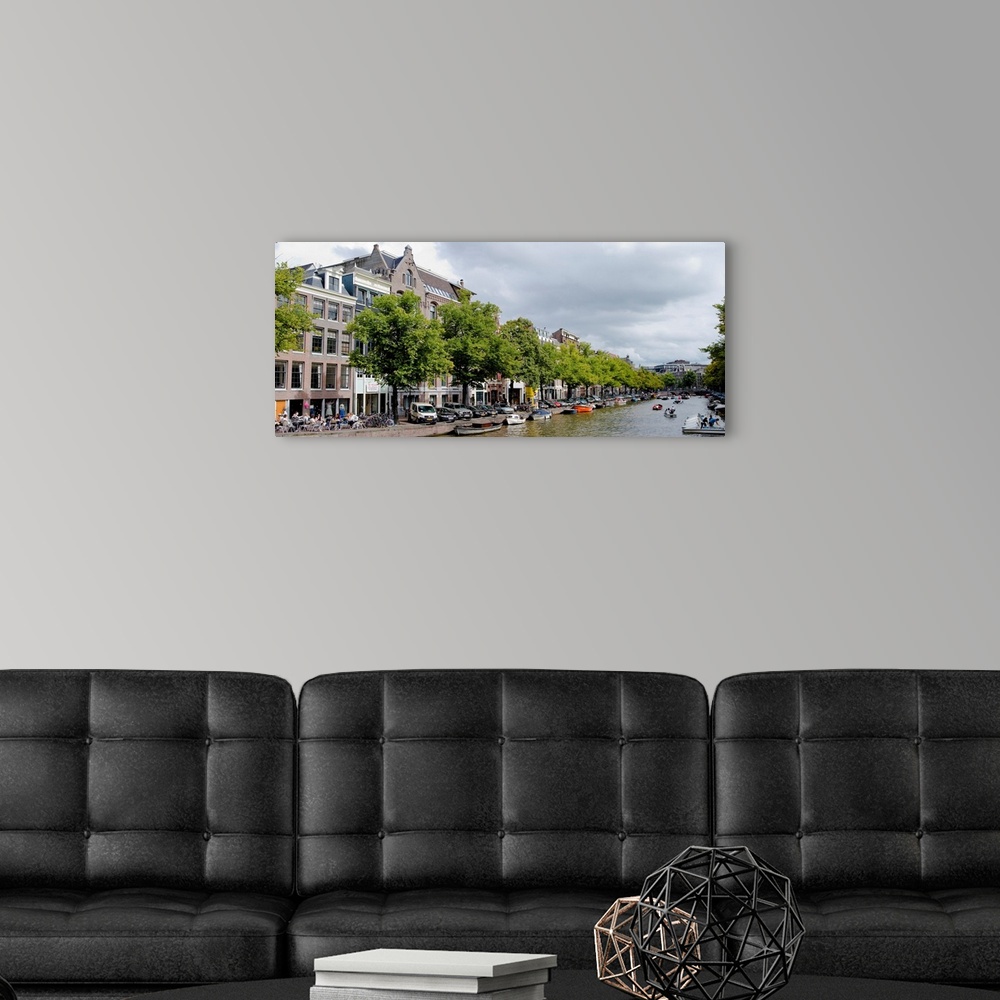 A modern room featuring Buildings along a canal, Amsterdam, Netherlands