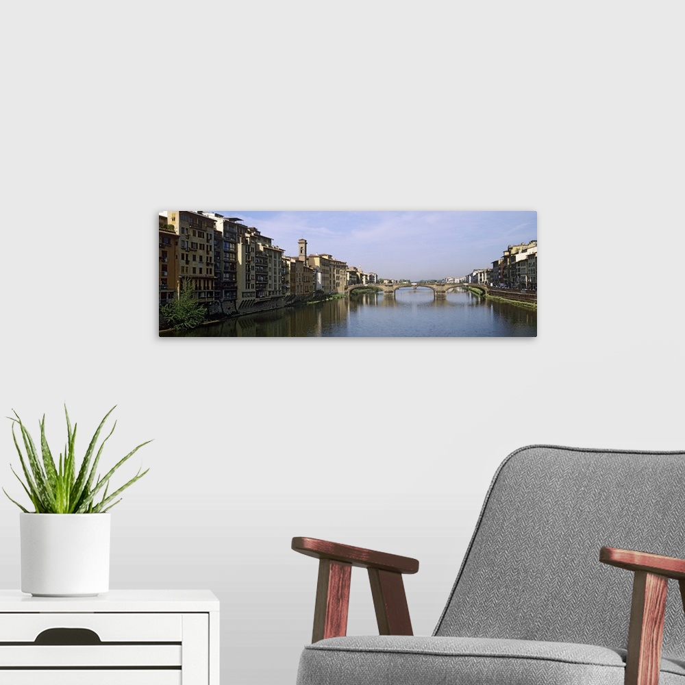 A modern room featuring Buildings along a river, Arno river, Florence, Tuscany, Italy