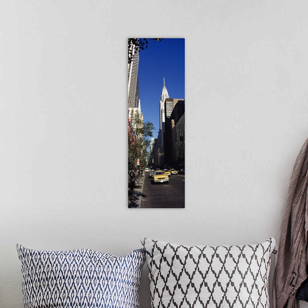 A bohemian room featuring Buildings along a road, Chrysler Building, Manhattan, New York City, New York State
