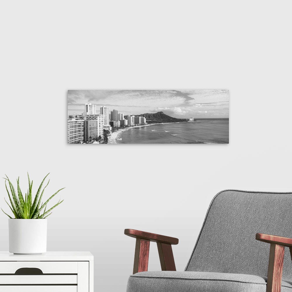 A modern room featuring Buildings at the coastline with a volcanic mountain in the background, Diamond Head, Waikiki, Oah...
