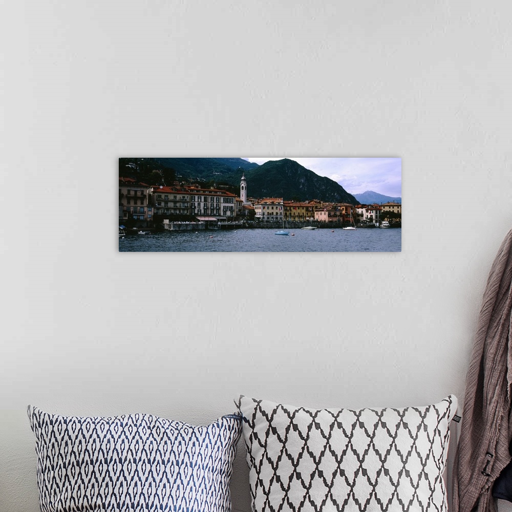 A bohemian room featuring Buildings at the lakeside viewed from a ferry, Lake Como, Menaggio, Como, Lombardy, Italy