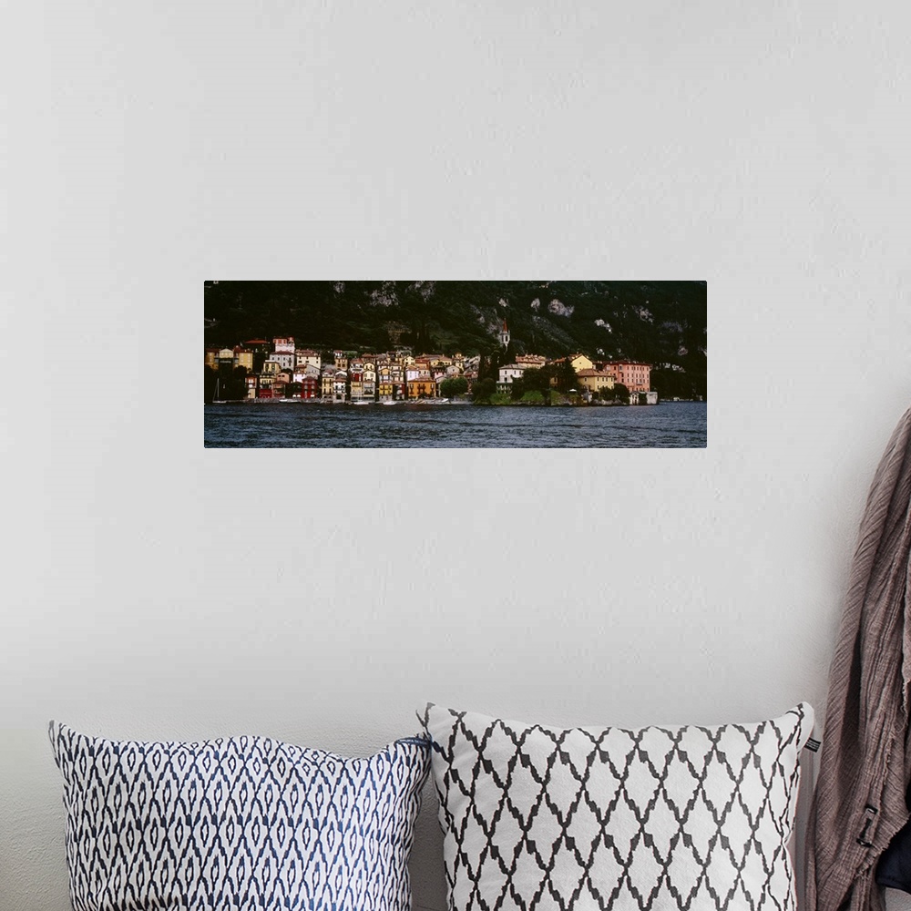 A bohemian room featuring Buildings at the lakeside viewed from a ferry, Varenna, Lake Como, Lecco, Lombardy, Italy