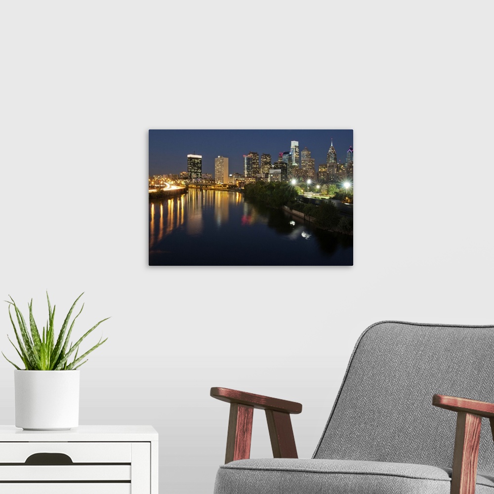 A modern room featuring Buildings at the waterfront at night, River Delaware, Philadelphia, Pennsylvania, USA