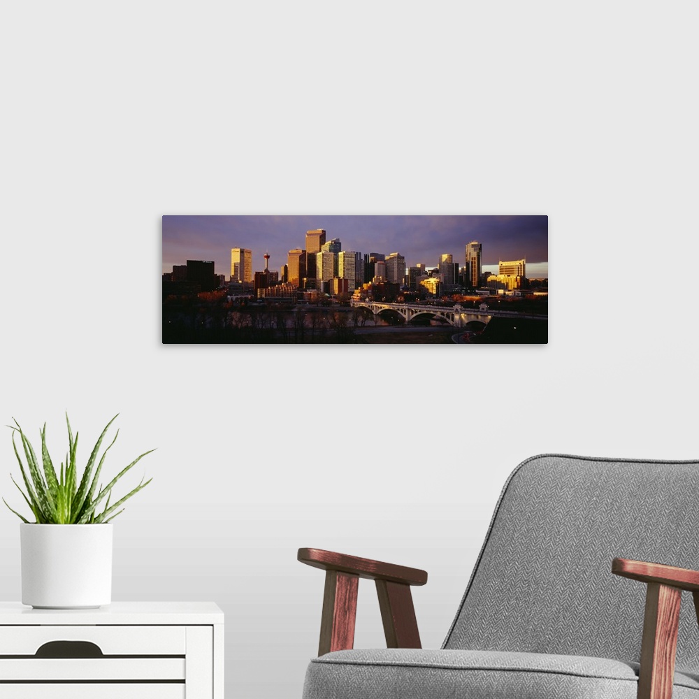 A modern room featuring Buildings at the waterfront, Bow River, Calgary, Alberta, Canada