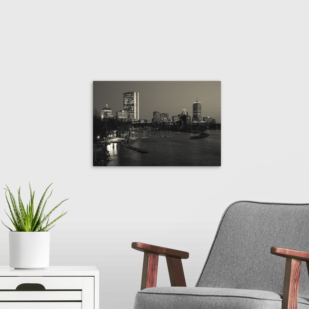 A modern room featuring Landscape, oversized photograph of the Boston skyline at night, including the Boston Back Bay and...