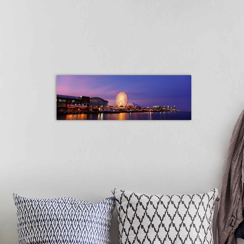 A bohemian room featuring Panoramic photo on canvas of buildings lit up along the waterfront in Chicago with a ferris wheel.