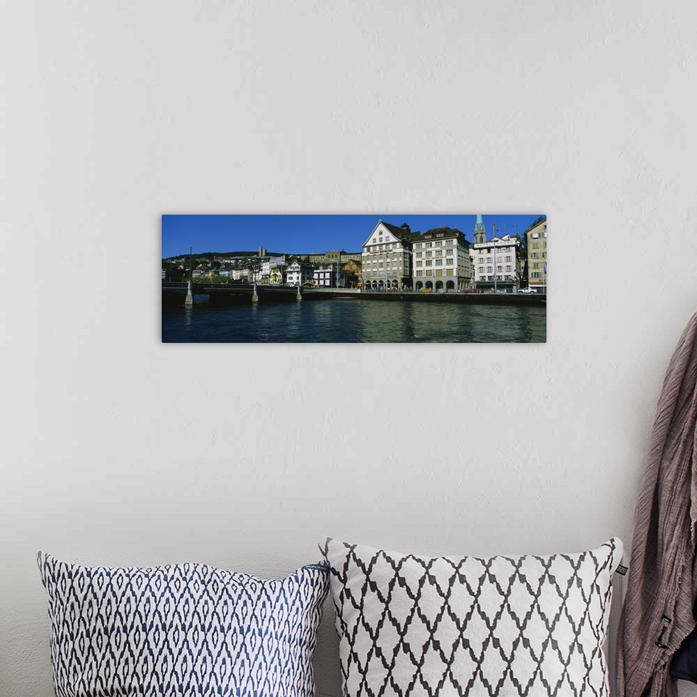 A bohemian room featuring Buildings at the waterfront, Limmat Quai, Zurich, Switzerland