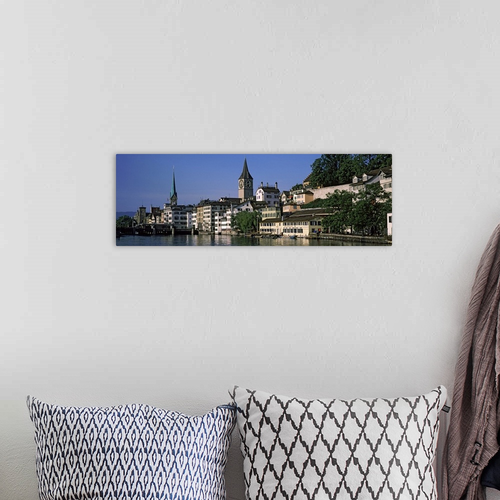 A bohemian room featuring Buildings at the waterfront, Limmat River, Zurich, Switzerland