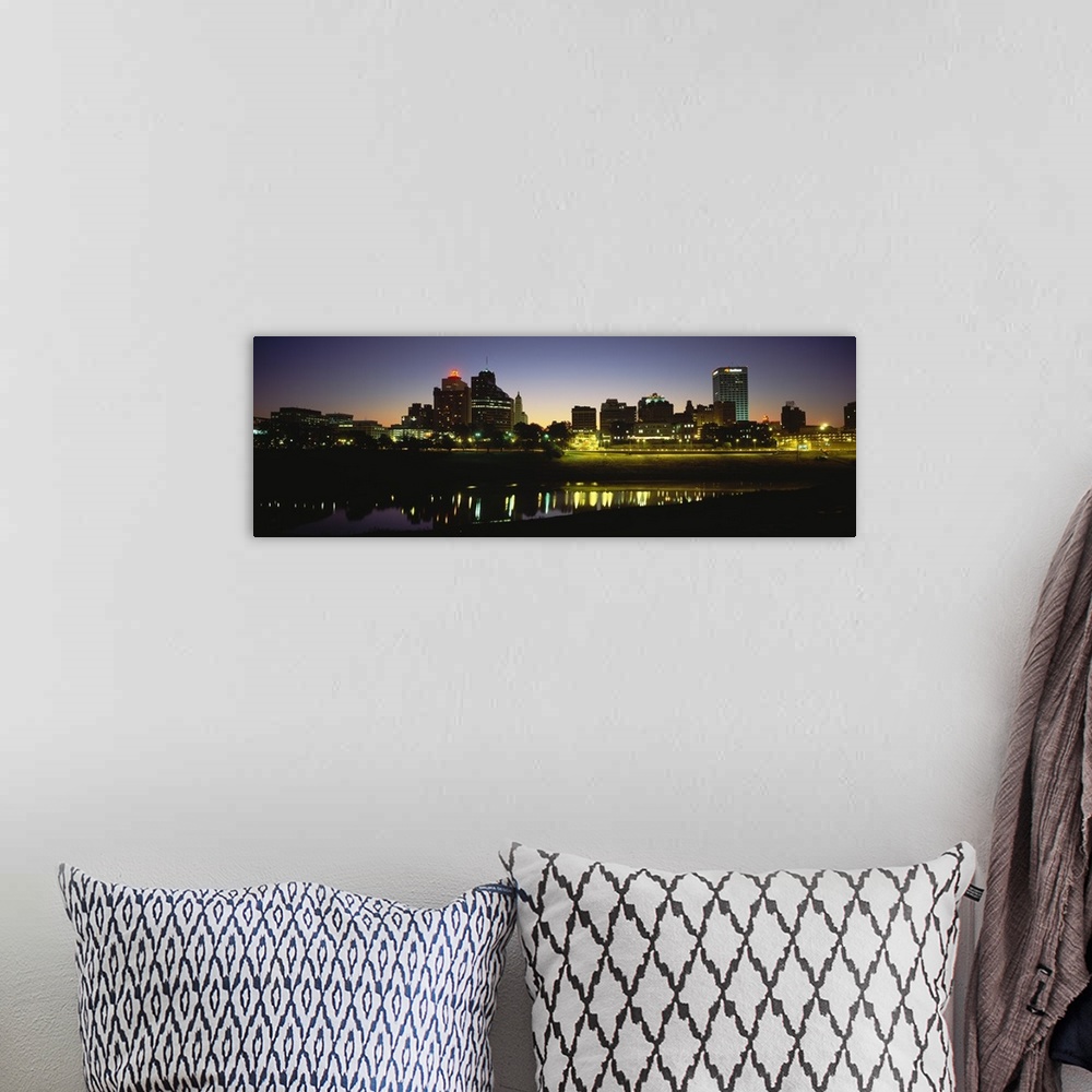 A bohemian room featuring Panoramic skyline of Memphis, Tennessee as the sun begins to rise over the Mississippi river.