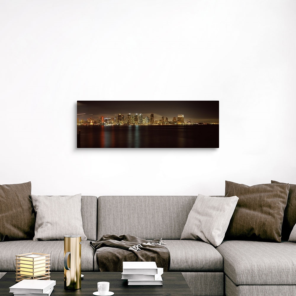 A traditional room featuring Panoramic photograph of the San Diego city skyline along the edge of the bay in the evening, the ...