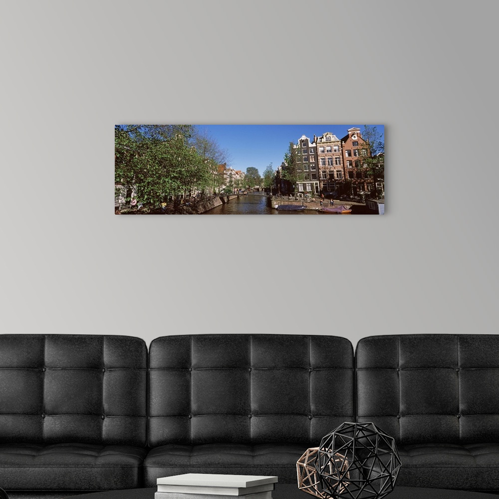 A modern room featuring Buildings in a city, Amsterdam, North Holland, Netherlands