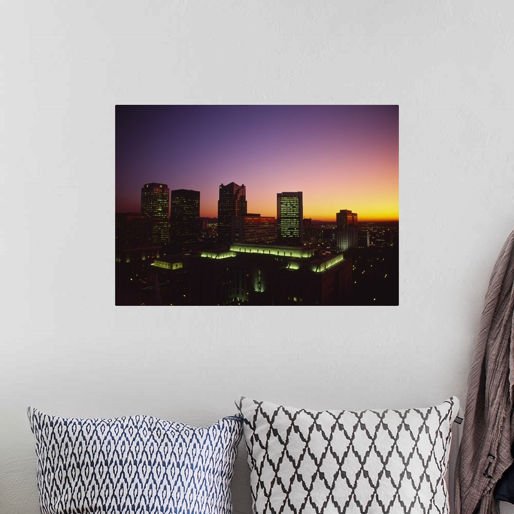 A bohemian room featuring Buildings in a city at dusk, Birmingham, Alabama,