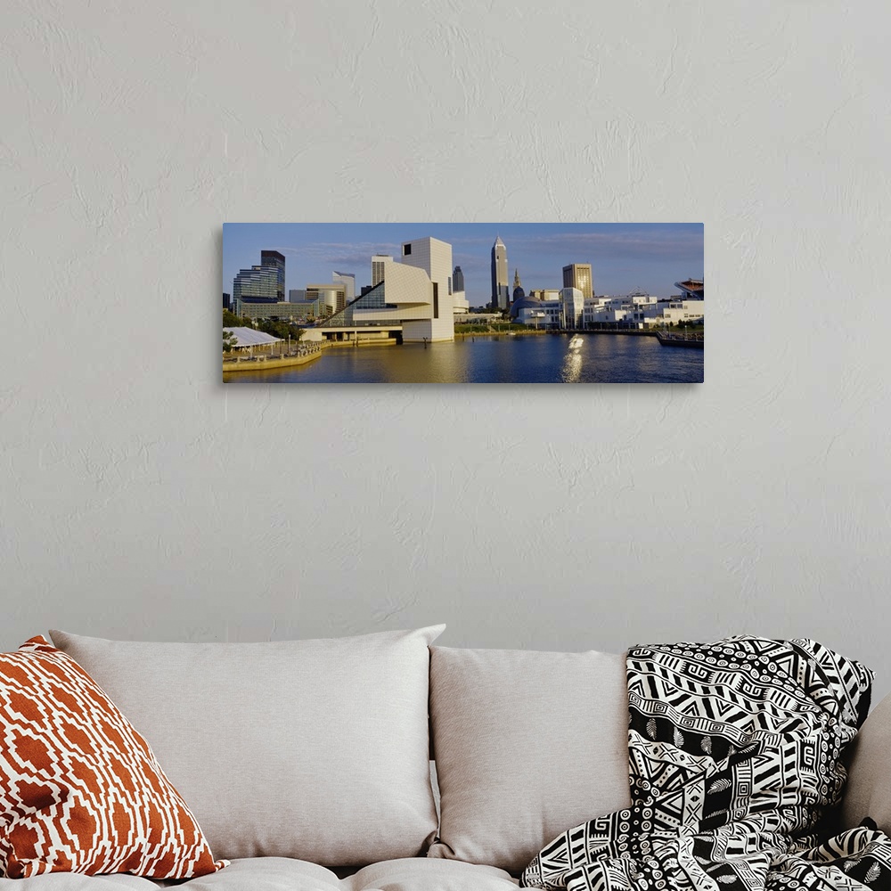 A bohemian room featuring Panoramic photograph of skyline and waterfront under a cloudy sky.