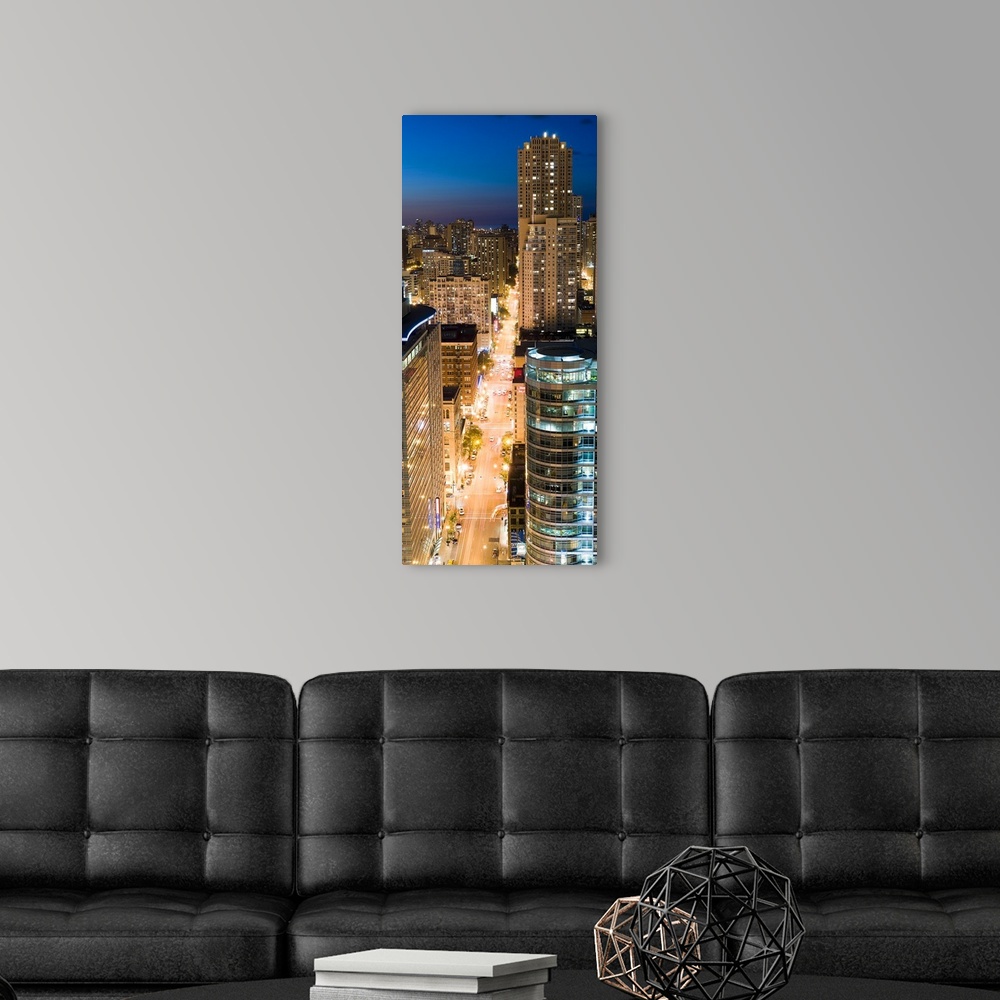 A modern room featuring Buildings in a city lit up at dusk, Dearborn Street, North Side, Chicago, Illinois,