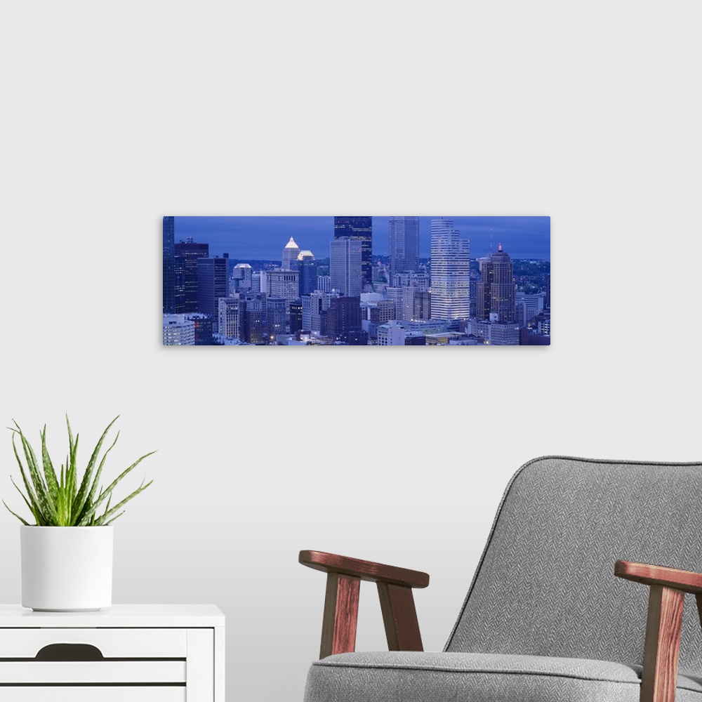 A modern room featuring Buildings in a city lit up at dusk, Pittsburgh, Pennsylvania