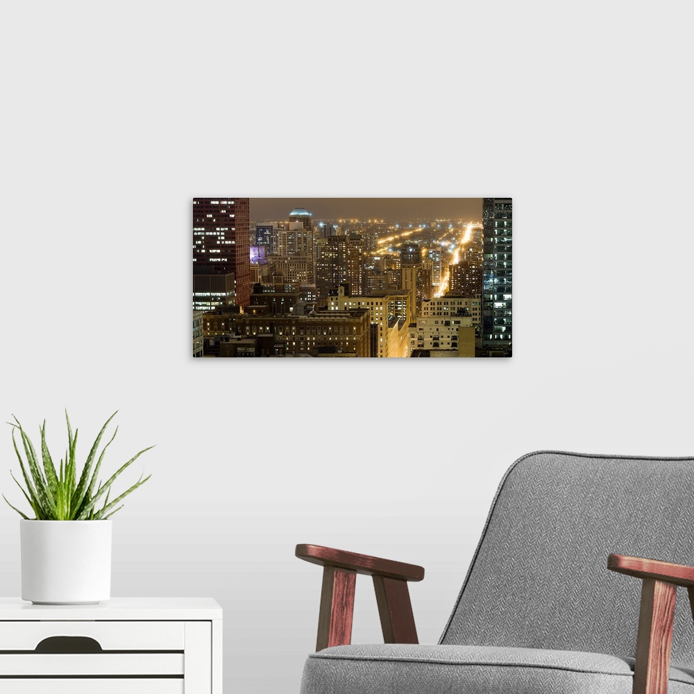 A modern room featuring Buildings in a city lit up at night, Chicago South Loop, Chicago, Illinois,