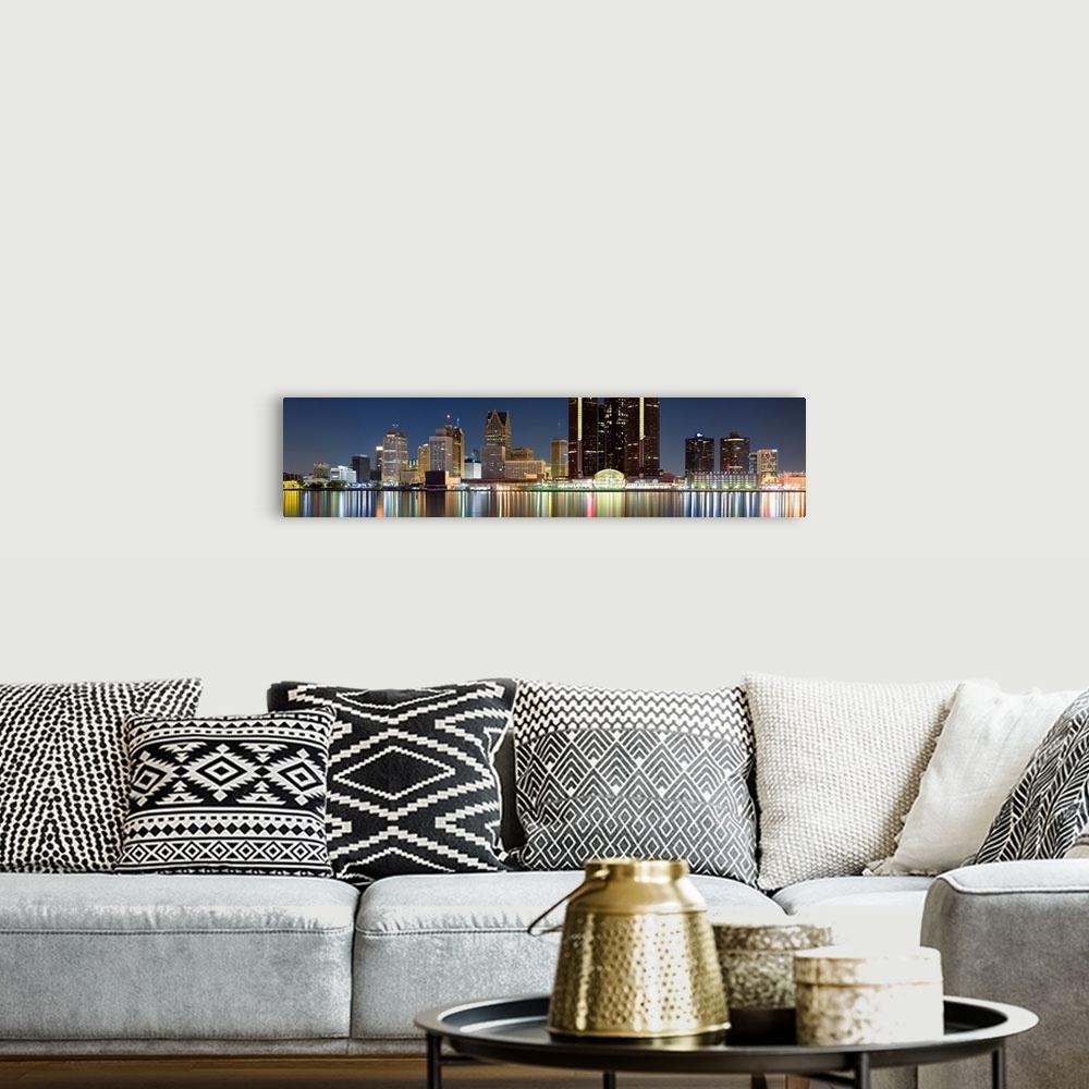 A bohemian room featuring Panoramic photograph of skyline after sunset with city lights reflected in waterfront.