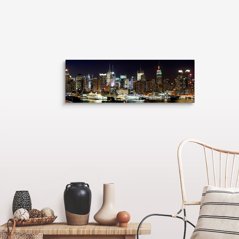 A farmhouse room featuring Oversized panoramic photograph of brightly lit skyscrapers in Manhattan, behind the reflecting wa...