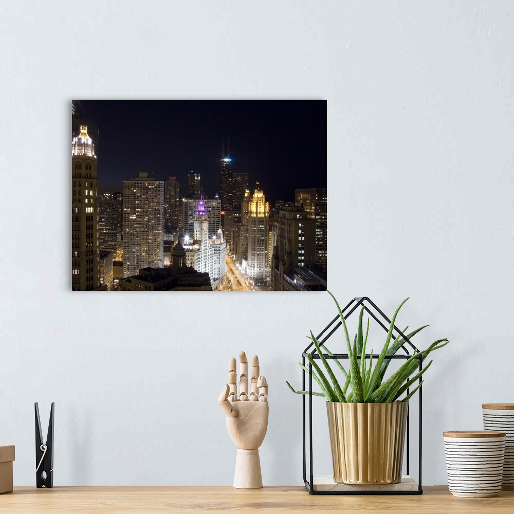 A bohemian room featuring Large photograph of downtown Chicago, Illinois (IL) lit up at night featuring the Magnificent Mil...