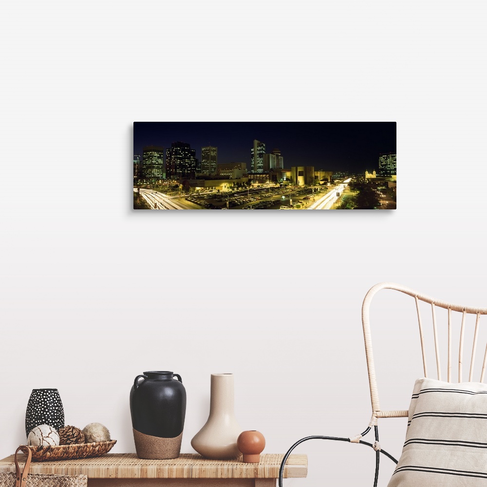 A farmhouse room featuring Panoramic canvas of buildings in Phoenix illuminated at night.