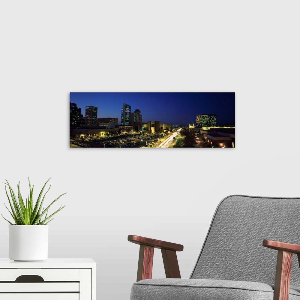 A modern room featuring Buildings in a city lit up at night, Phoenix, Maricopa County, Arizona