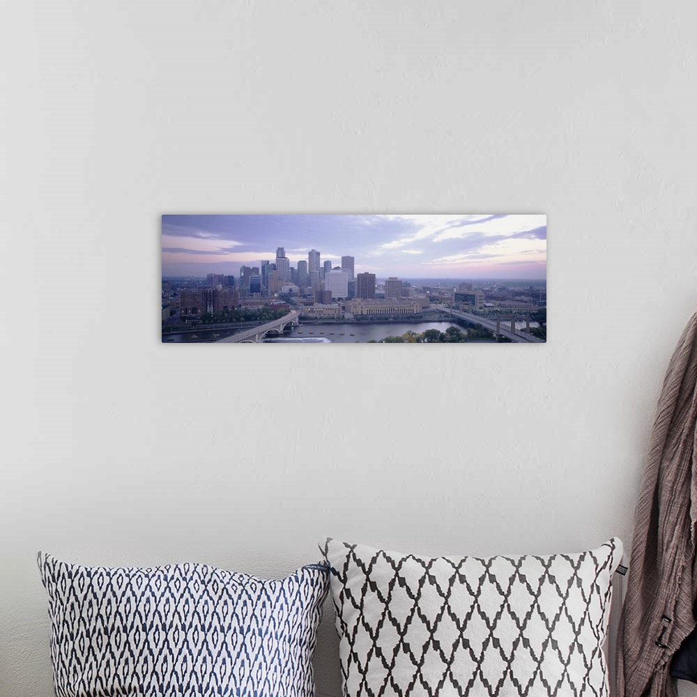 A bohemian room featuring Large panoramic picture of downtown Minneapolis sitting on the banks of the Mississippi River.