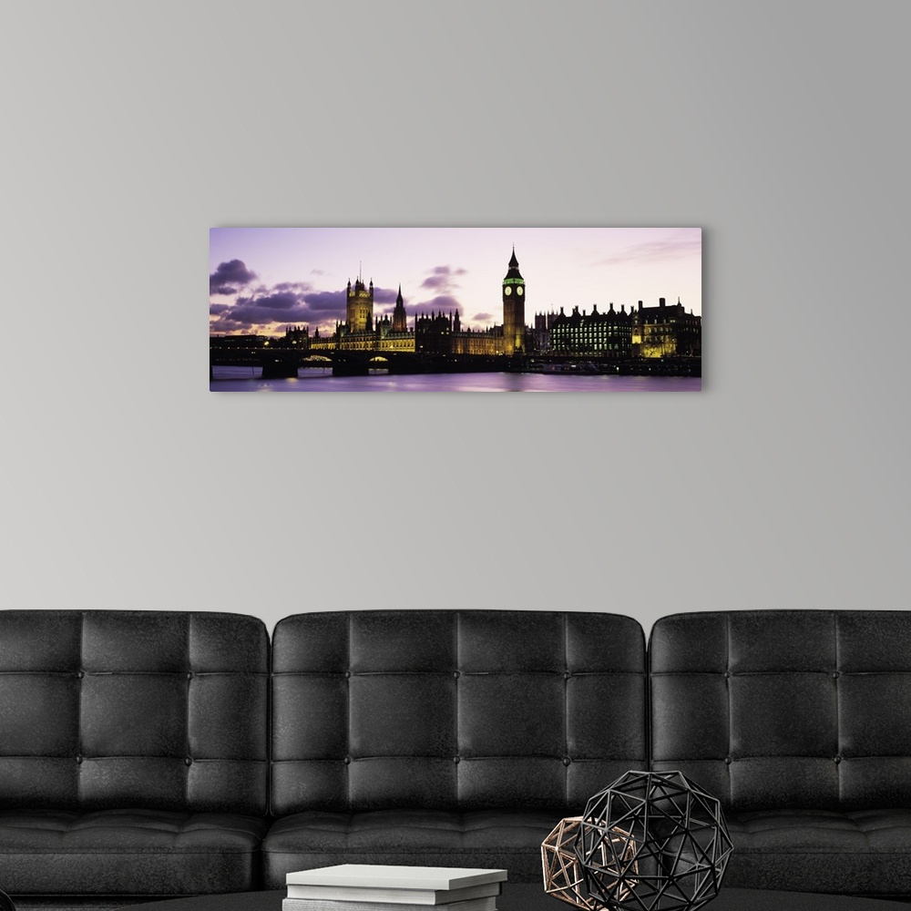 A modern room featuring This is a panoramic photograph taken from the opposite shore of the river showcasing famous landm...