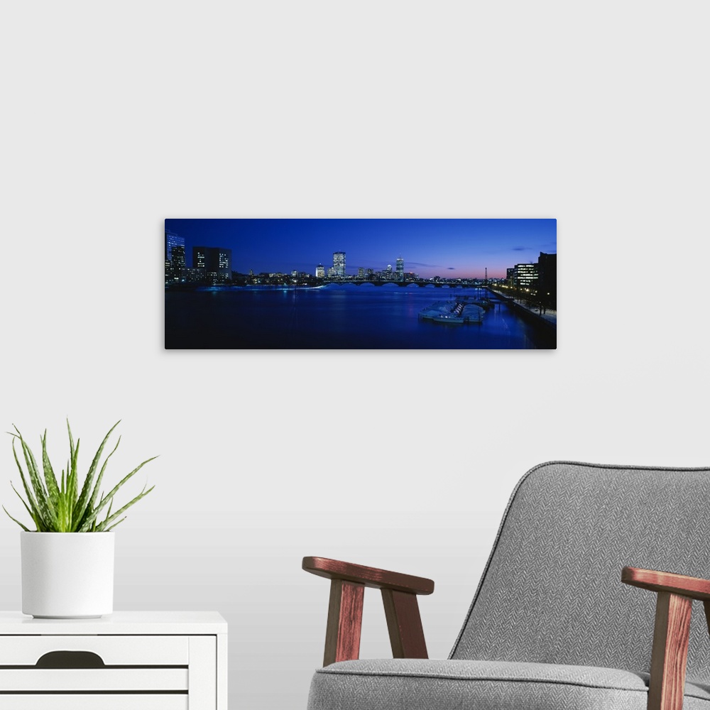 A modern room featuring Buildings lit up at dusk, Charles River, Boston, Massachusetts
