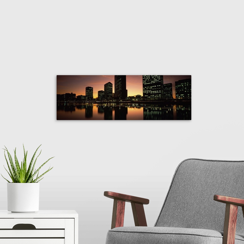 A modern room featuring Buildings lit up at dusk, Oakland, Alameda County, California,