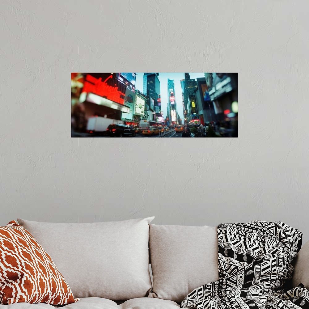 A bohemian room featuring Buildings lit up at dusk Times Square Manhattan New York City New York State