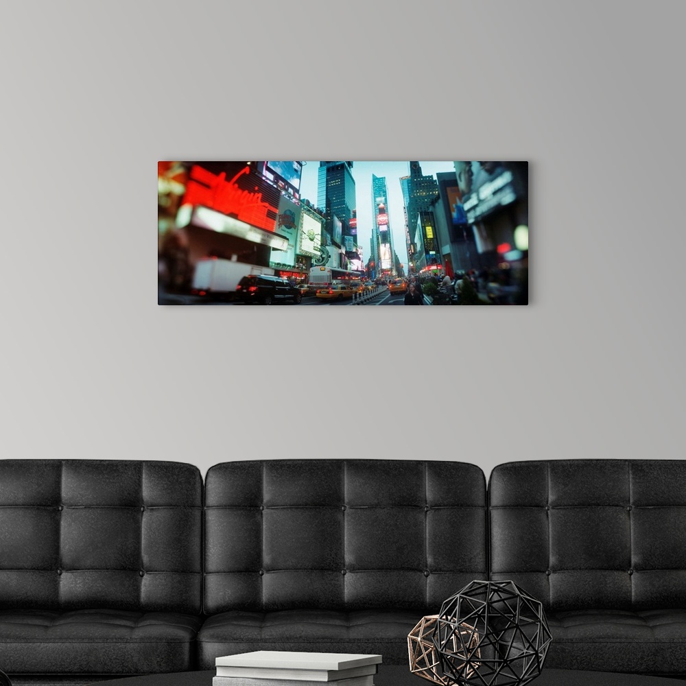 A modern room featuring Buildings lit up at dusk Times Square Manhattan New York City New York State