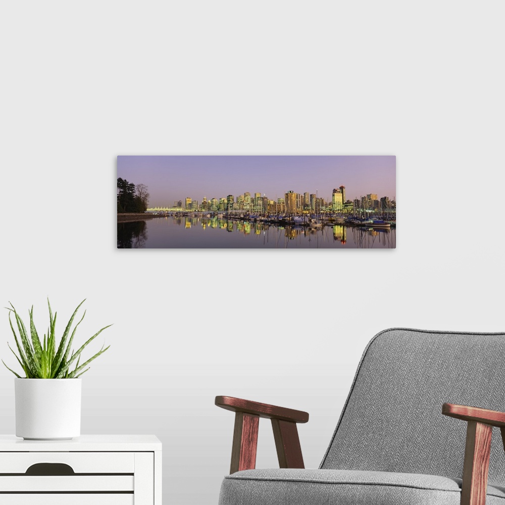 A modern room featuring Buildings lit up at dusk, Vancouver, British Columbia, Canada