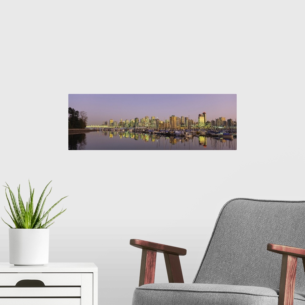 A modern room featuring Buildings lit up at dusk, Vancouver, British Columbia, Canada