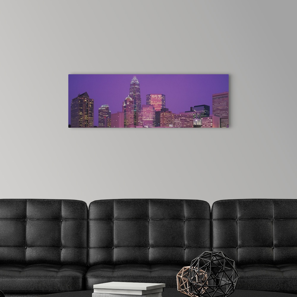 A modern room featuring Buildings lit up at night, Charlotte, Mecklenburg County, North Carolina,