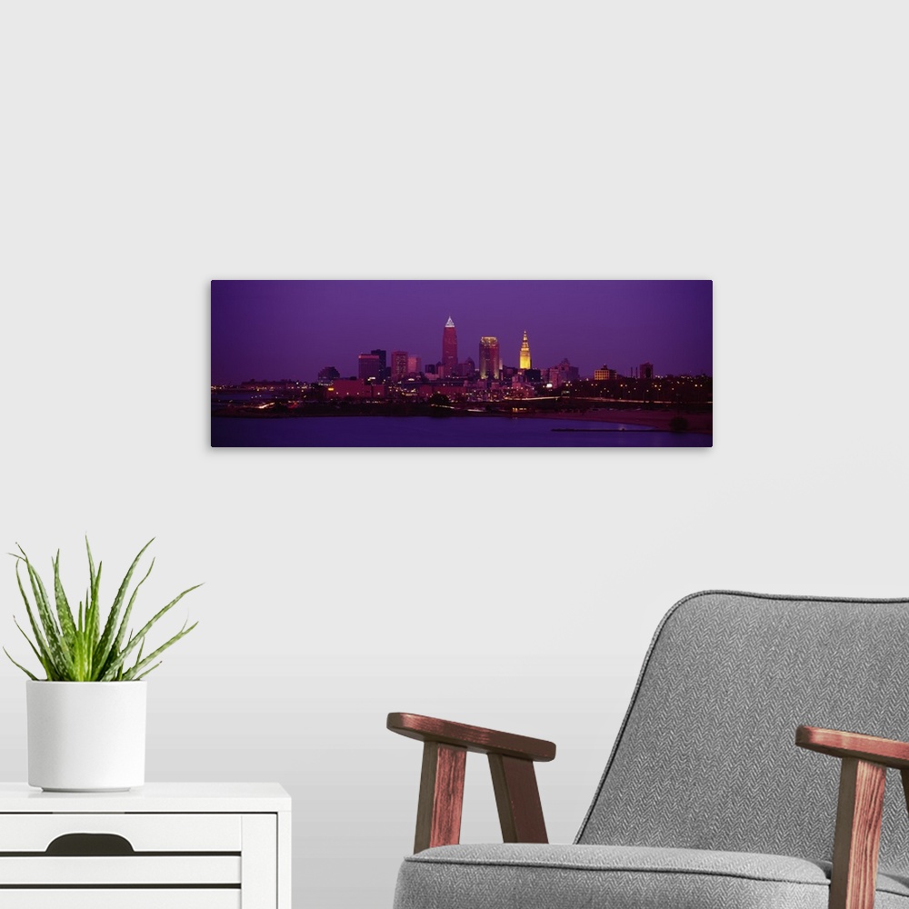 A modern room featuring Downtown panorama at night in Cleveland, Ohio.