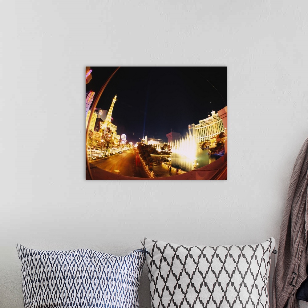 A bohemian room featuring Big photograph of downtown Las Vegas, Nevada (NV) lit up at night.