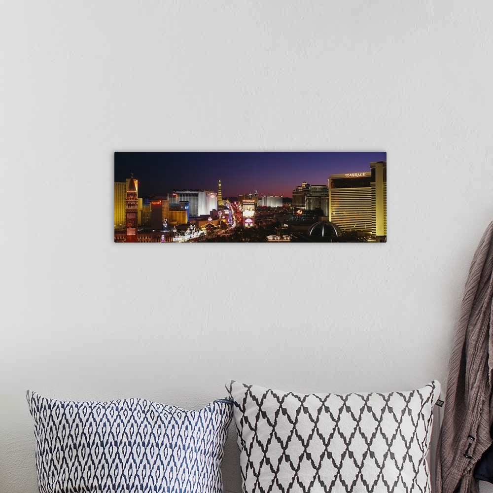 A bohemian room featuring Panoramic photograph focuses on the busy strip surrounded by famous hotels and casinos like The M...
