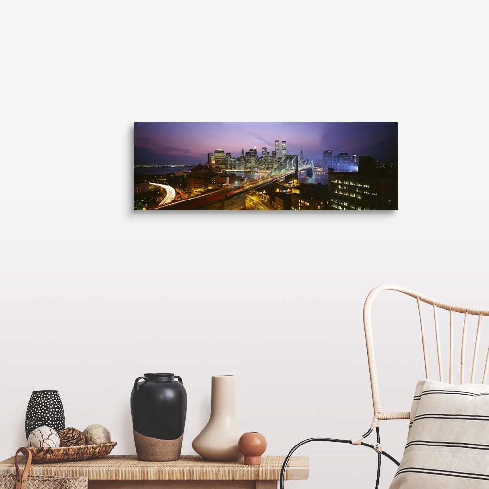 A farmhouse room featuring Panoramic image of lower Manhattan lit up at night with the World Trade Center buildings  and the...