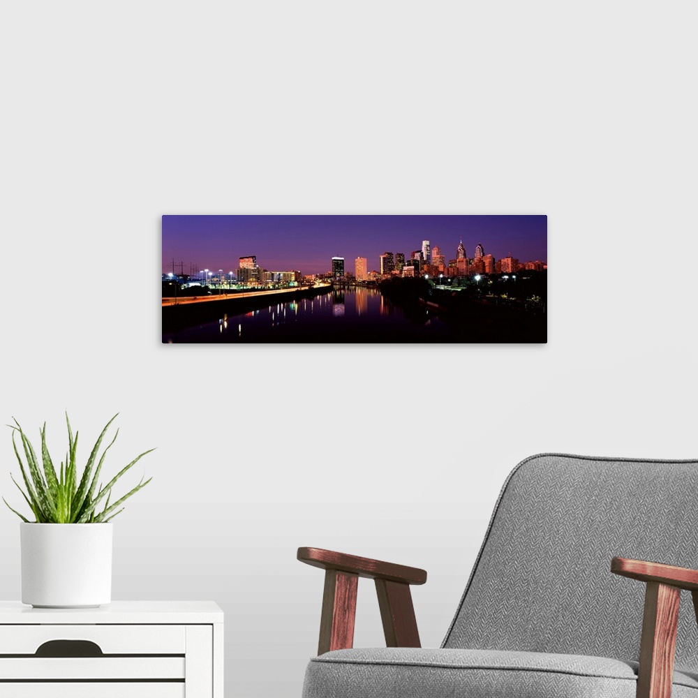 A modern room featuring Buildings lit up at the waterfront, Philadelphia, Schuylkill River, Pennsylvania