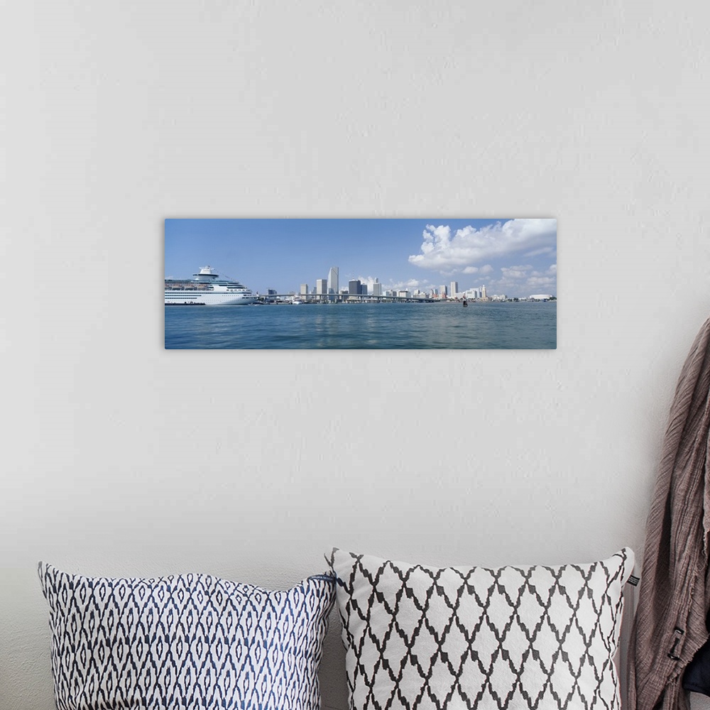 A bohemian room featuring Panoramic view of Miami Florida's Biscayne Bay waterfront with ship on the water.