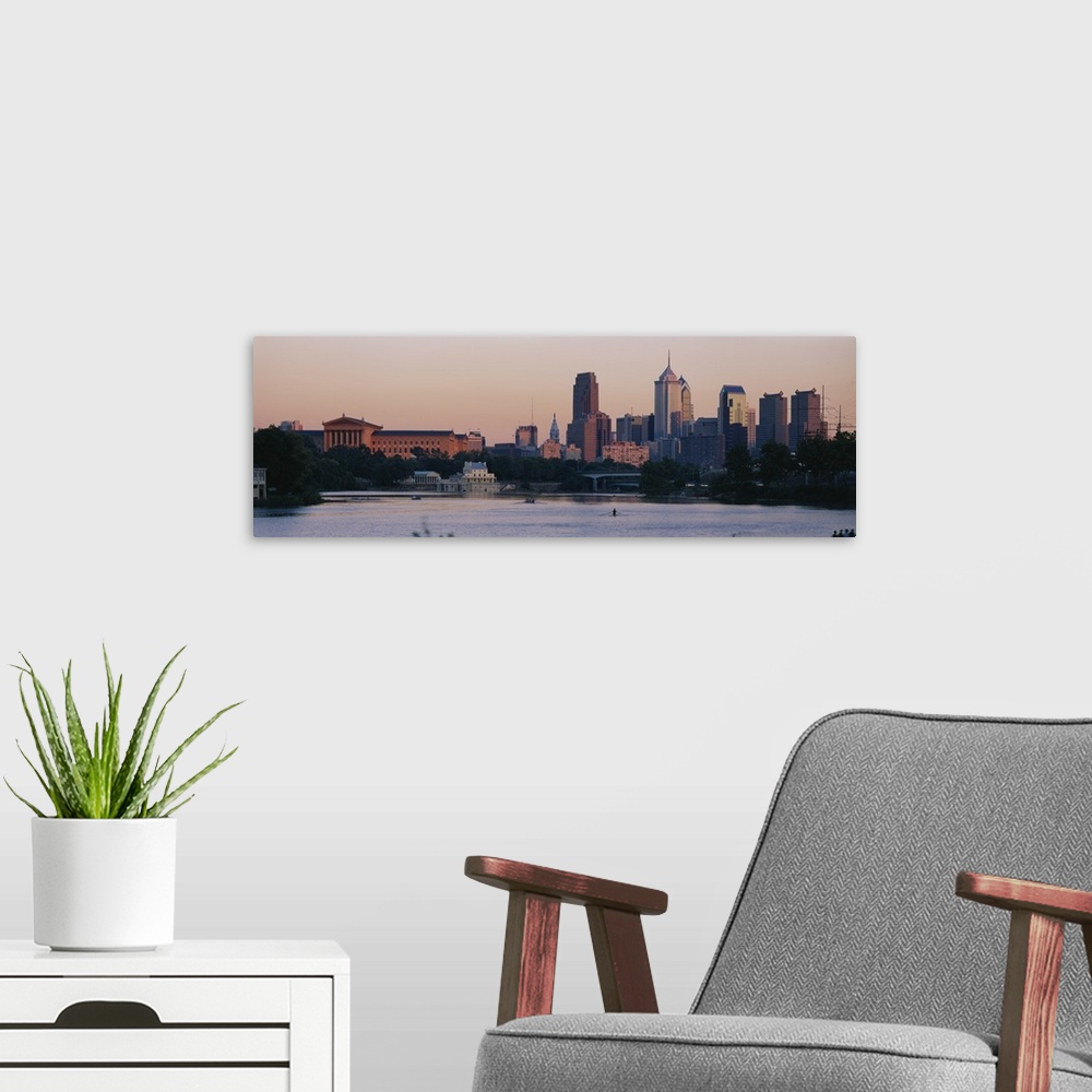 A modern room featuring Panoramic style picture of downtown Philadelphia with rowers working out on the Schuylkill River.