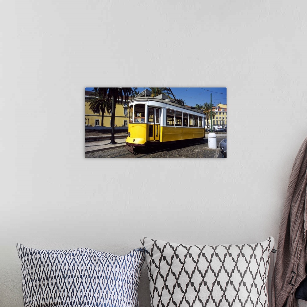 A bohemian room featuring Cable car in a city Lisbon Portugal