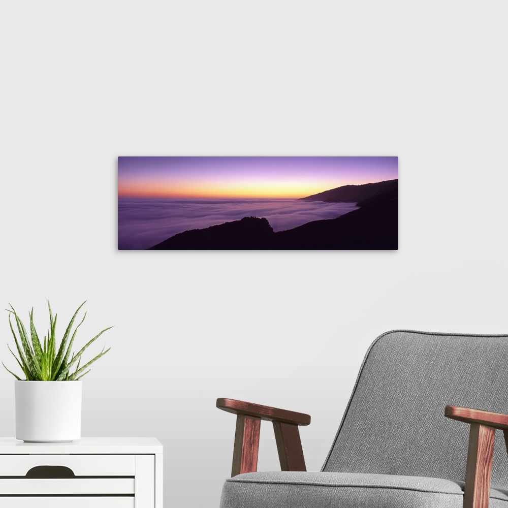 A modern room featuring California, Big Sur, Marine Layer, Big Sur at dusk