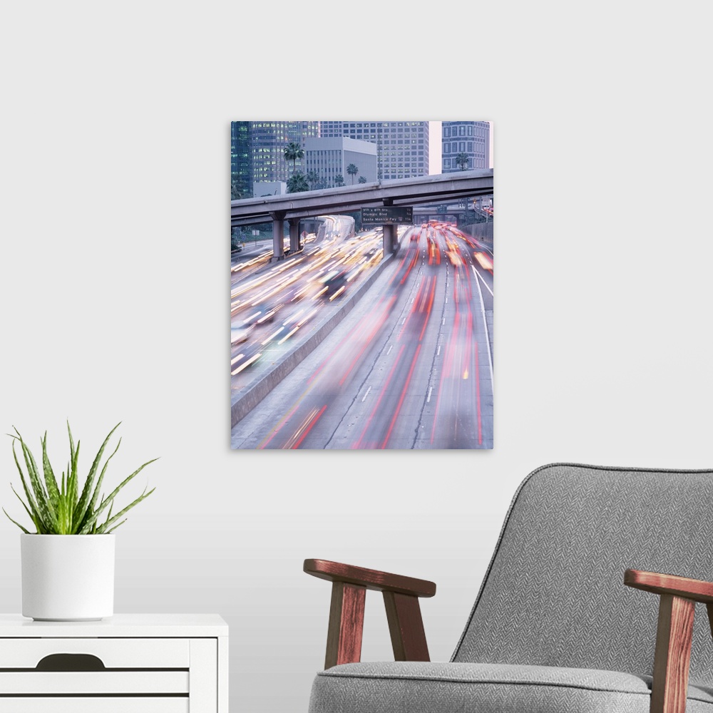 A modern room featuring Streaks of lights are photographed as traffic in Los Angeles moves quickly in either direction do...