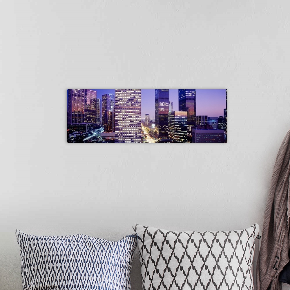 A bohemian room featuring Big photo on canvas of an up close view of buildings in downtown LA.