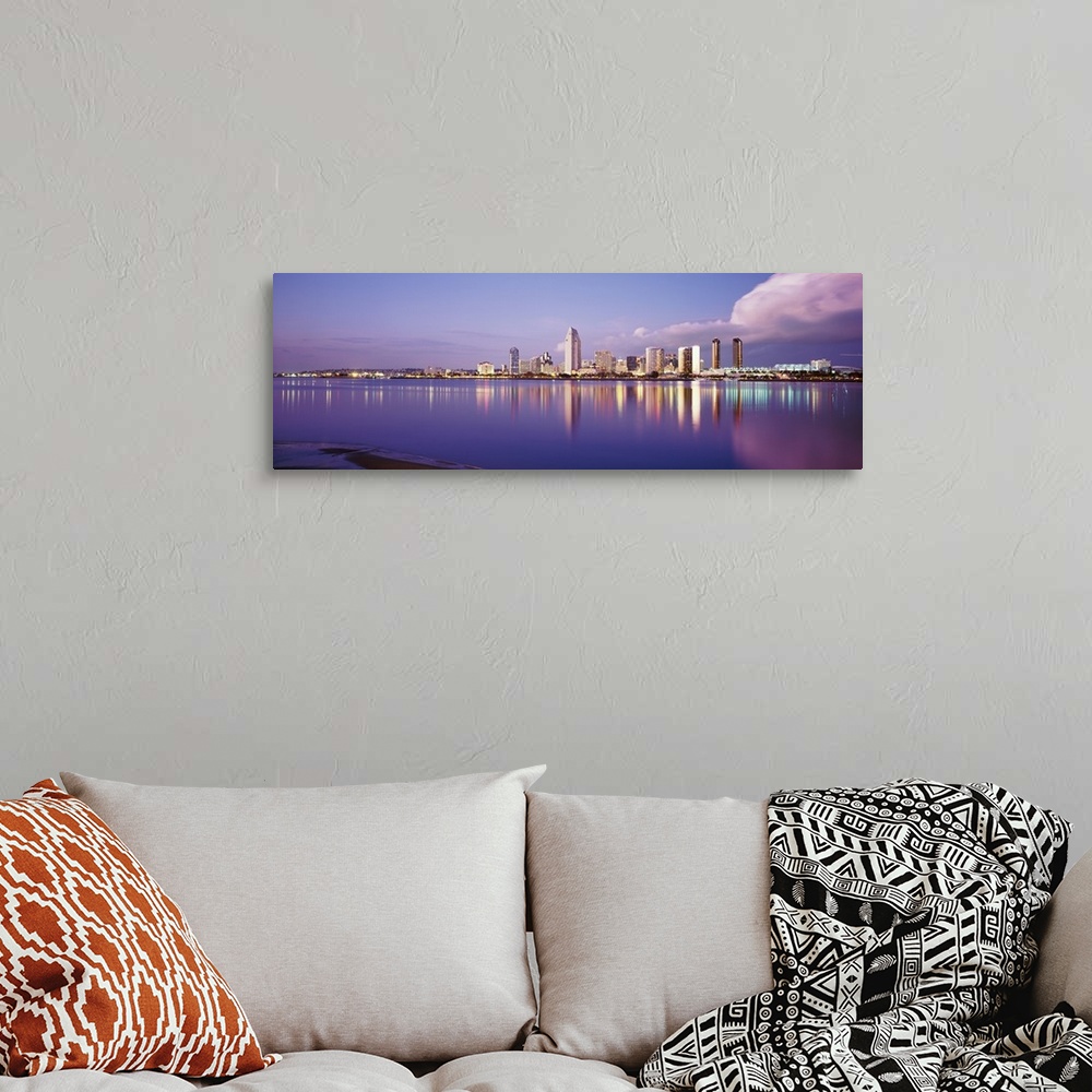 A bohemian room featuring Giant photograph on a landscape wall hanging of the San Diego skyline, including the financial di...