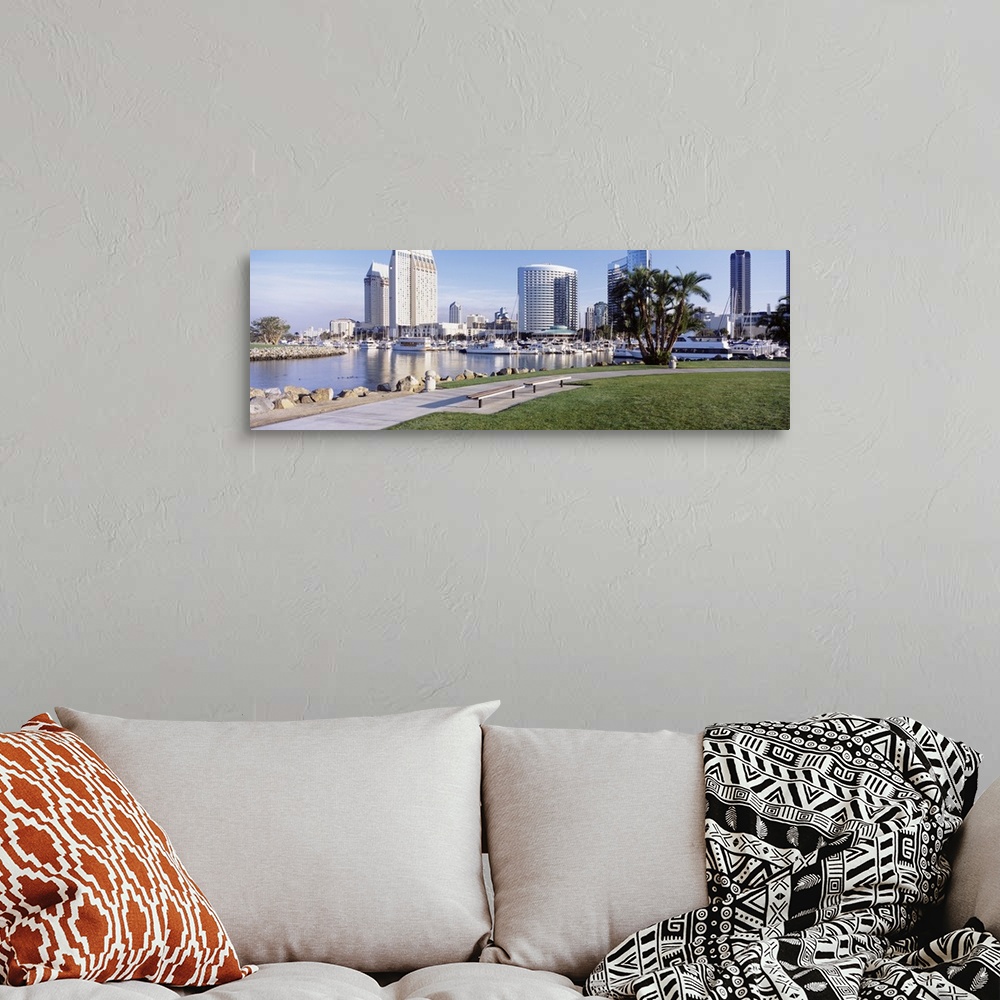 A bohemian room featuring View of San Diego, CA Marina Park with palm trees and skyline.